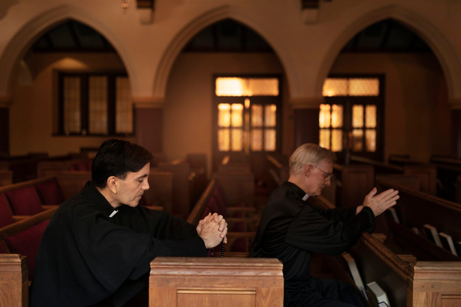 priests-praying-together-church