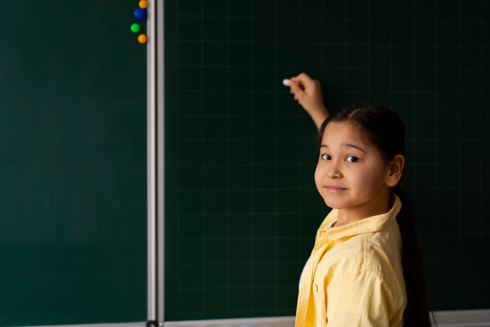 side-view-kid-writing-board